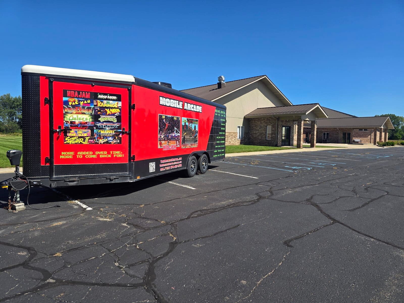 The Arcade Rental mobile arcade trailer parked outside for the Harvest Church Youth Group in Goshen
